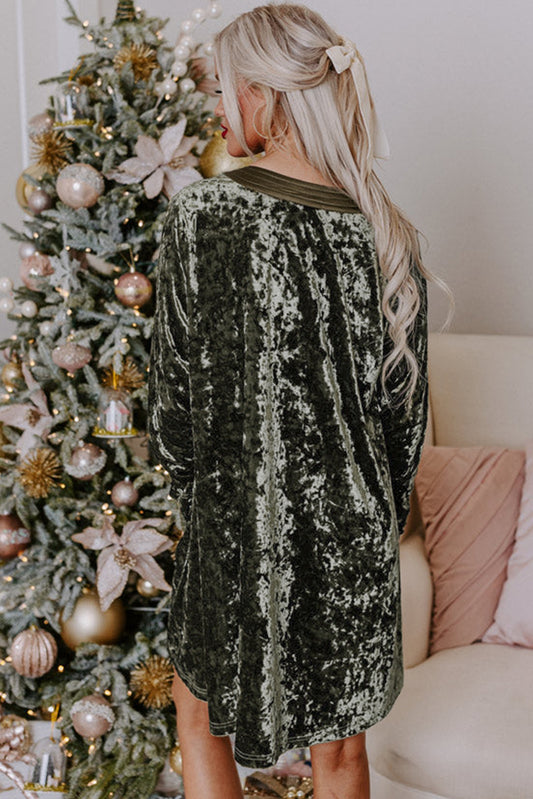 Vestido de terciopelo verde con bolsillos