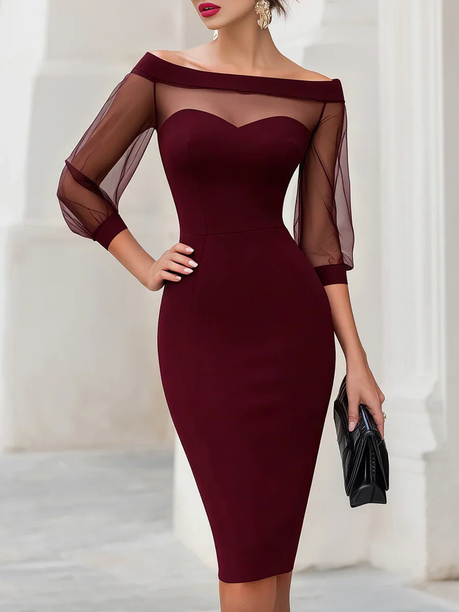 Vestido BB Bellezachic con escote corazón, mangas transparentes y diseño elegante para ocasiones especiales.