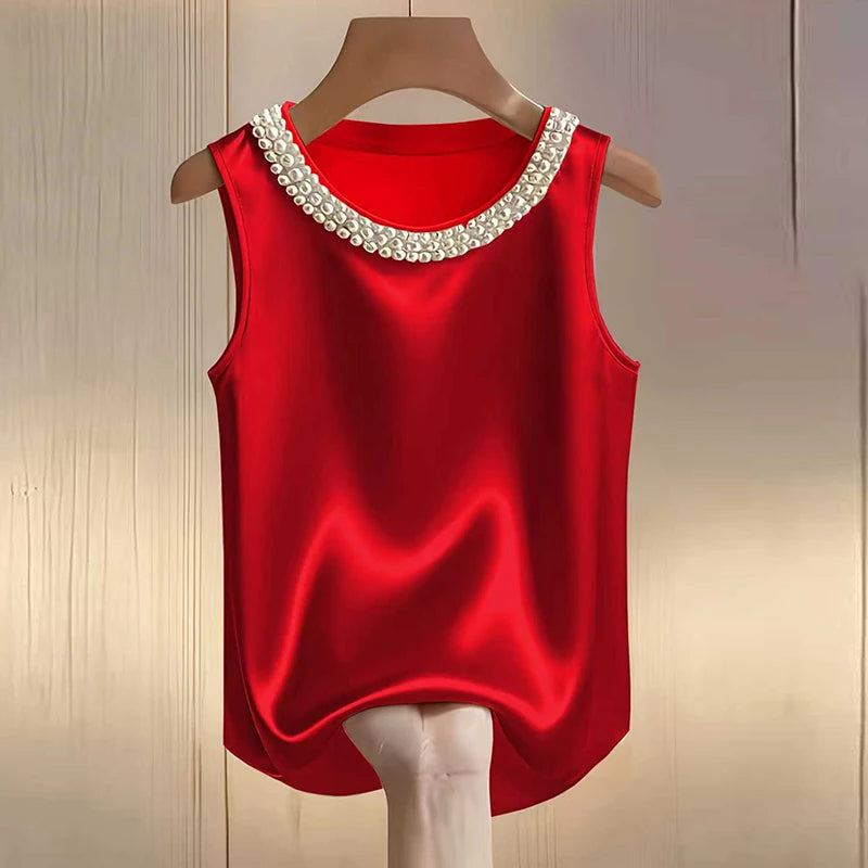 Top Perla Satin – Blusa Elegante con Diseño de Perlas
